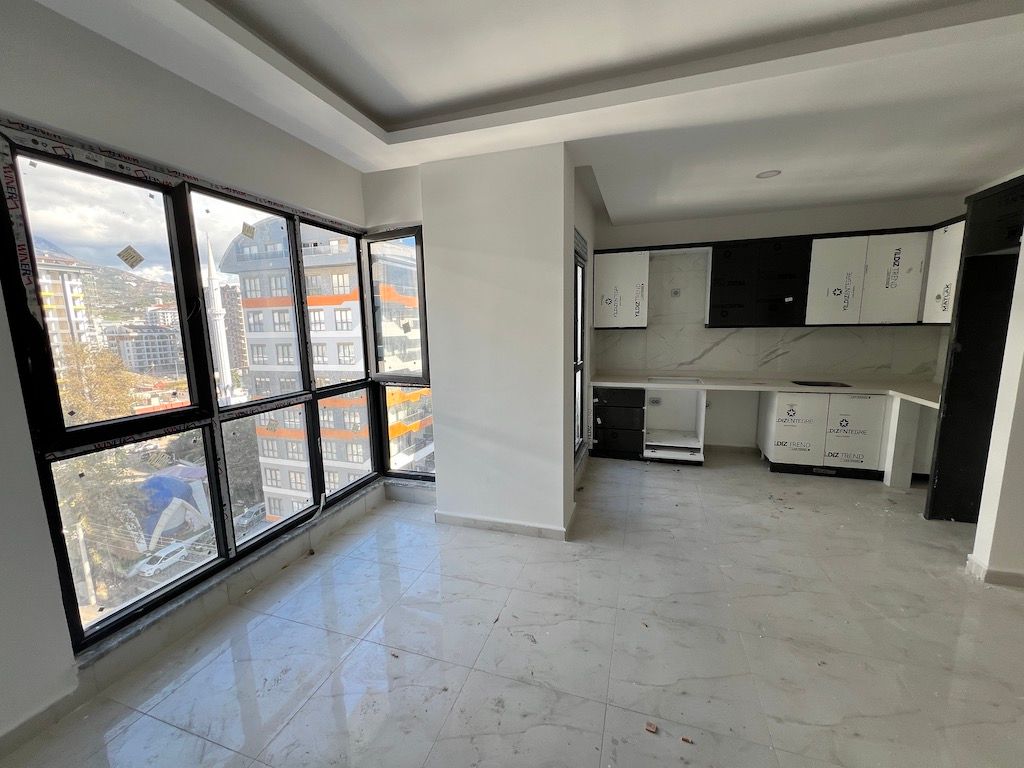 Купить квартиру 1+1 в Nexus Residence, Махмутлар, Алания | Новый дом у моря